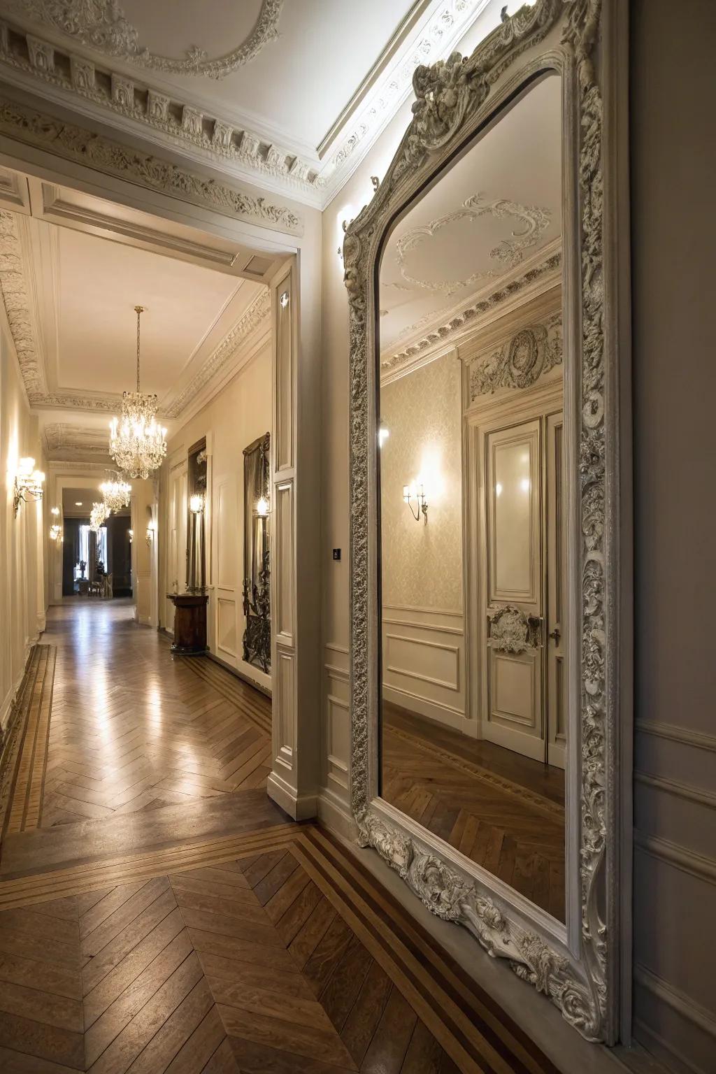 A decorative mirror artfully manipulates light, thereby augmenting the spaciousness of the entryway.