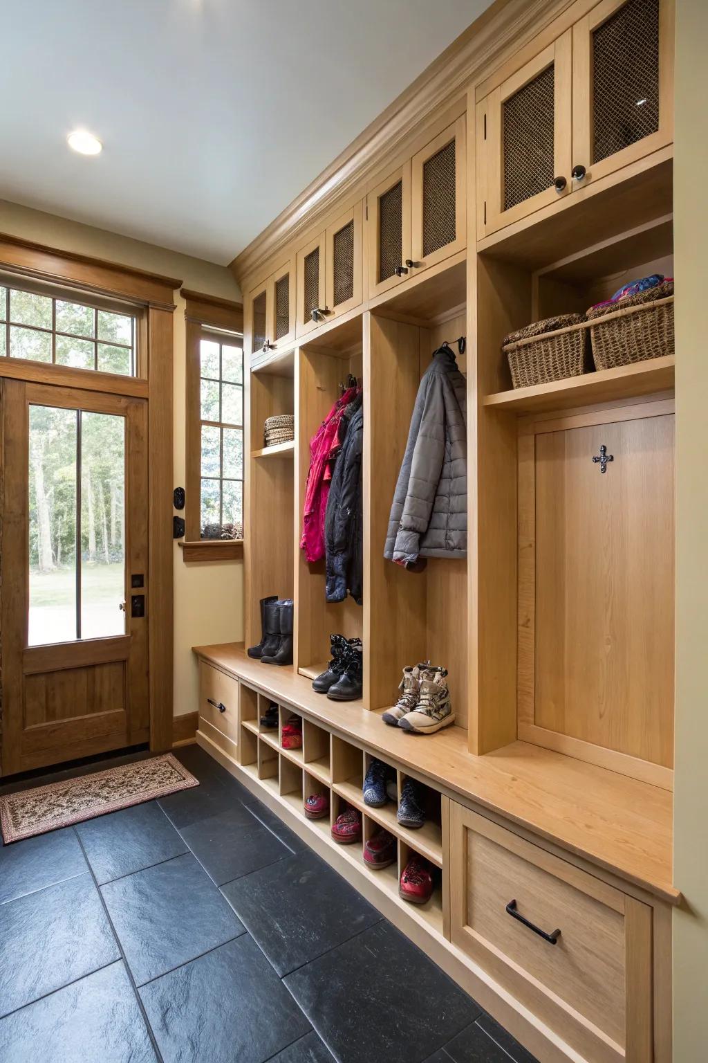 Bespoke cabinets and cubbies guarantee a tidy and well-organized mudroom.