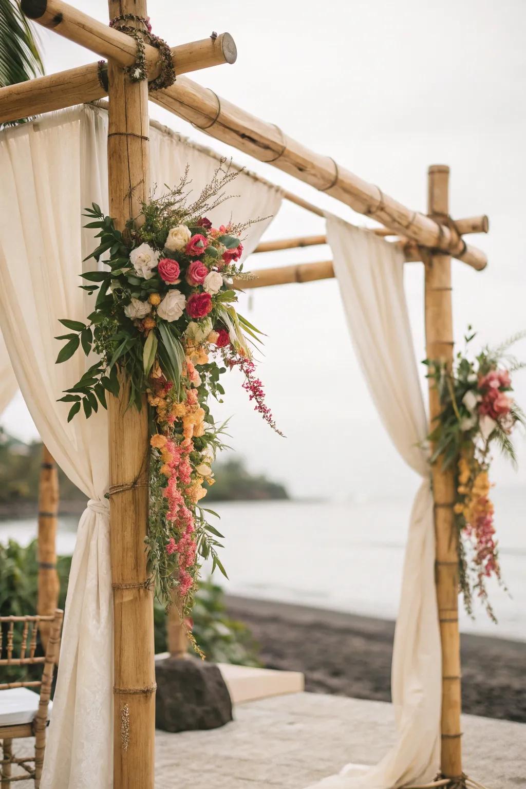A refined cane arch gracefully draped with flowers and fabric.