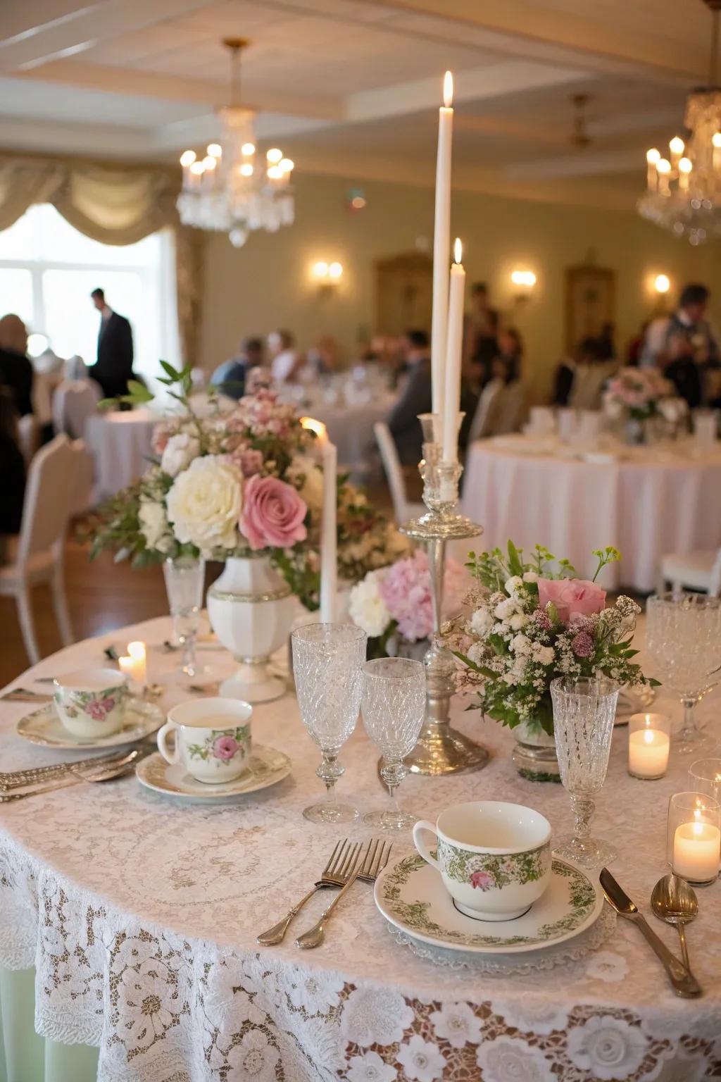 An elegant vintage wedding dining arrangement enhanced by net overlays.