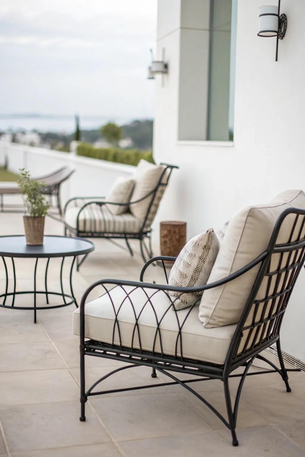 Refined and simple wrought iron designs harmonize seamlessly within a minimalist patio setting.