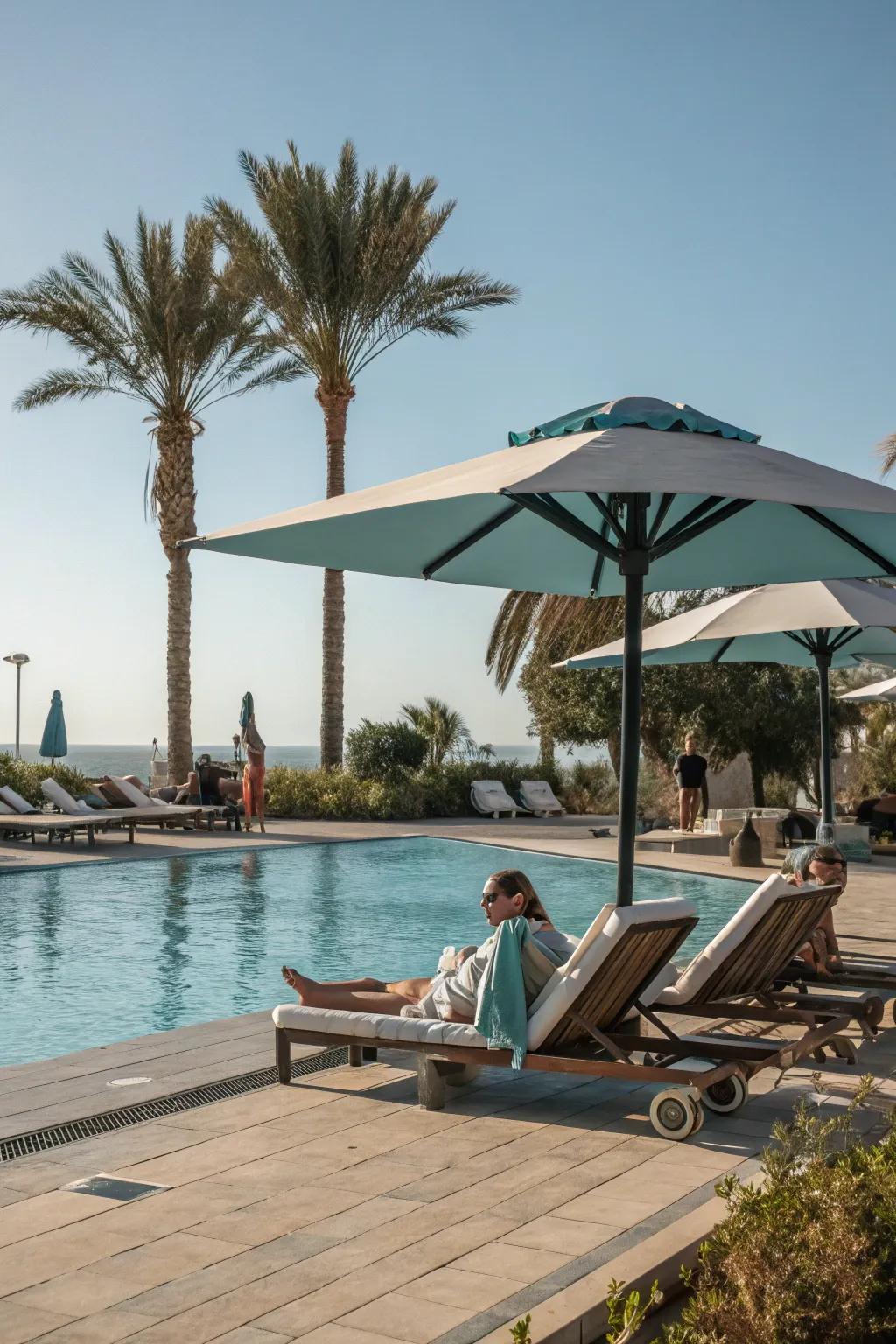 A refreshing poolside retreat with parasol shade.