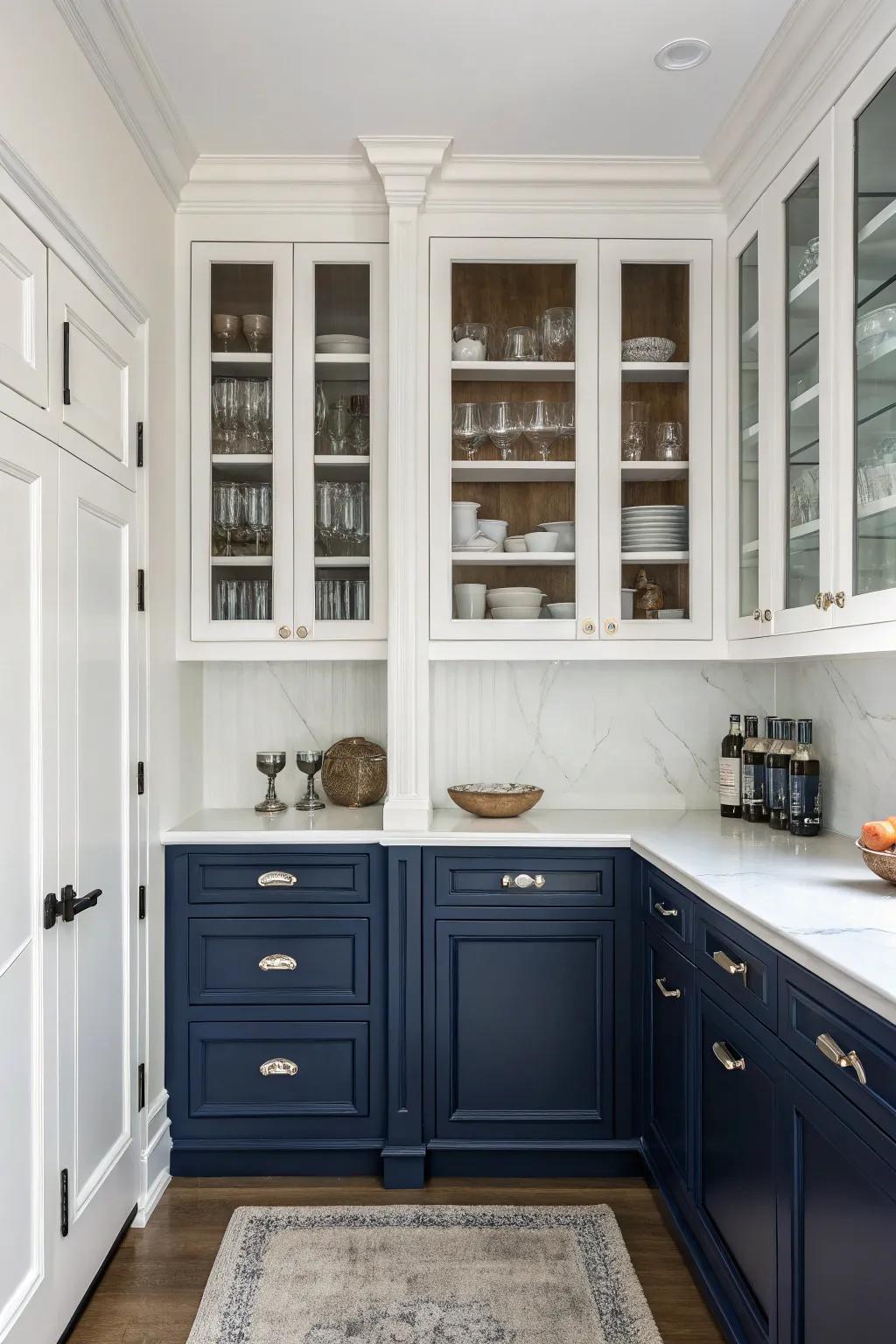 Elegant bicolored cabinets exhibited in a distinguished navy and white pairing.