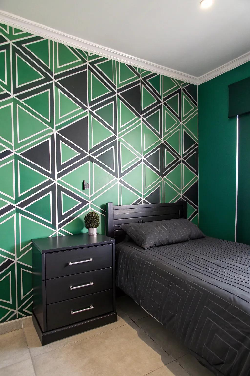 Green and ebony geometric wallpaper contributes a modern edge.