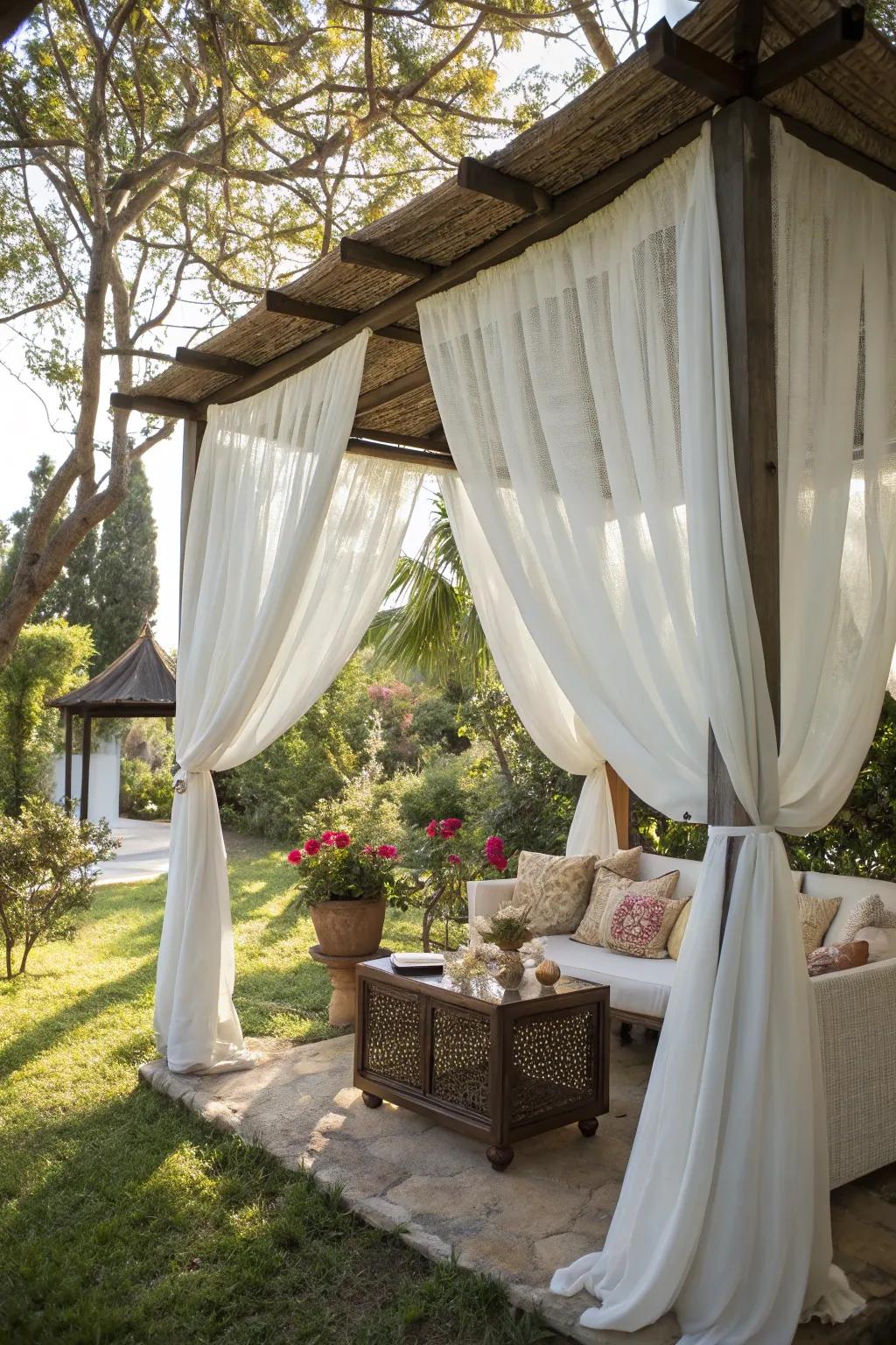 Soft curtains impart sophistication and seclusion to your outdoor setting.