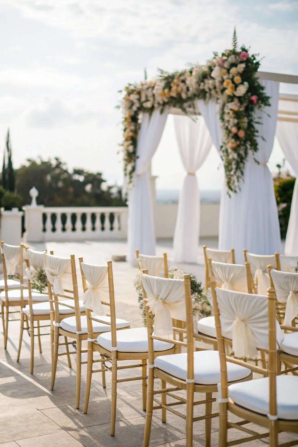 Luxurious seating defined by white and gold chairs.