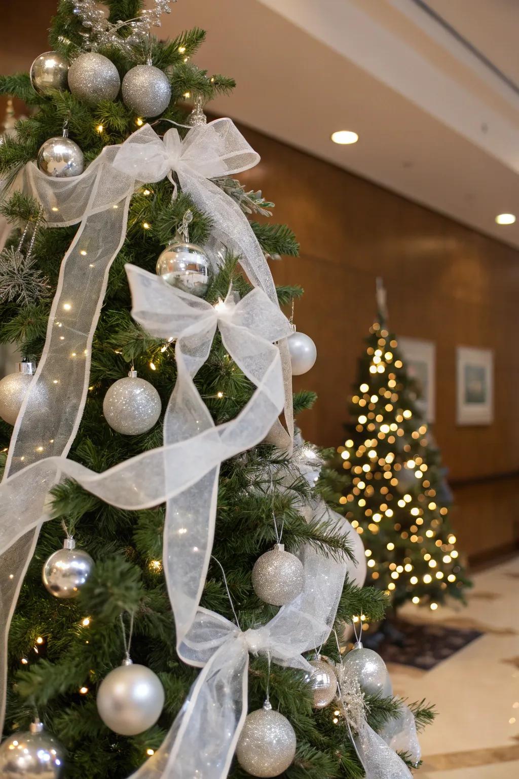 White ribbons provide a subtle, stylish detail to the tree.