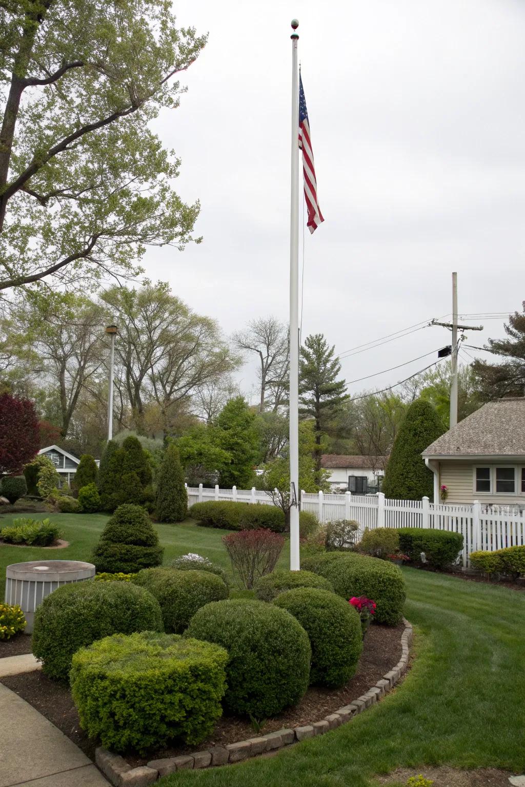 Bushes and hedges form a rich backdrop for any flagpole.