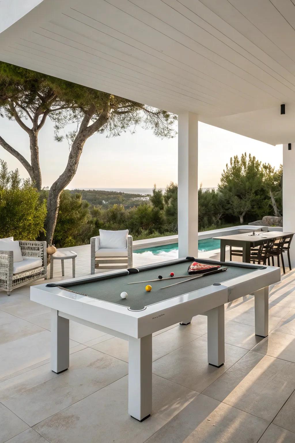 A stylish, modern outdoor pool table setup with minimalist furniture.