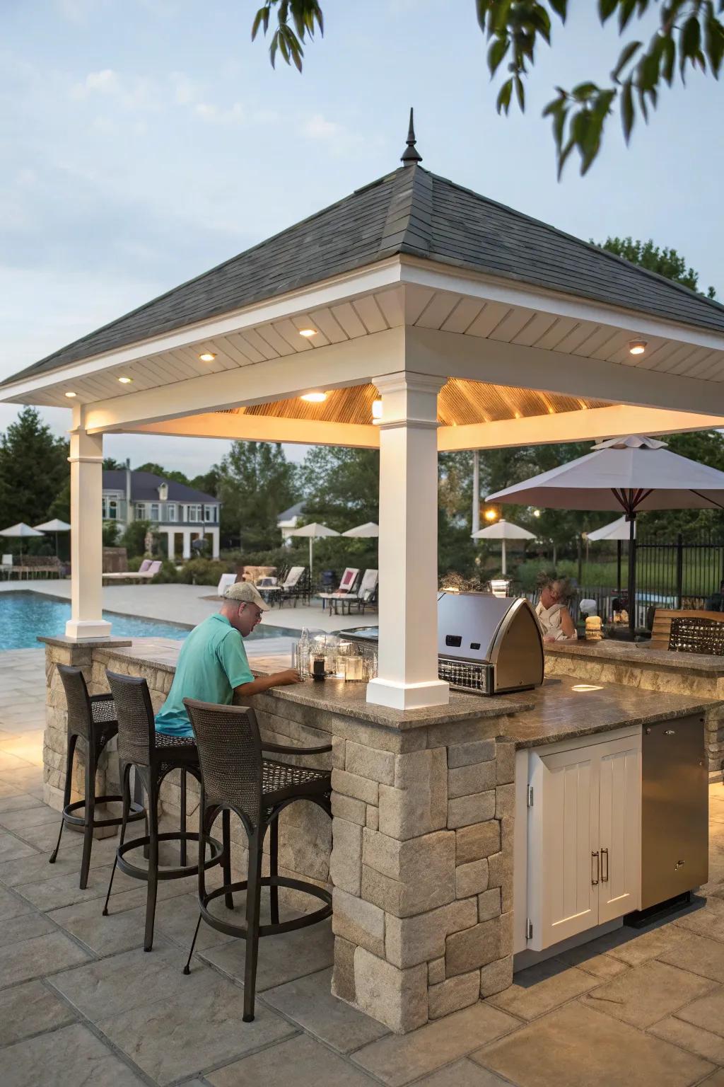 An exterior culinary shelter is impeccable for poolside cooking and hosting gatherings.