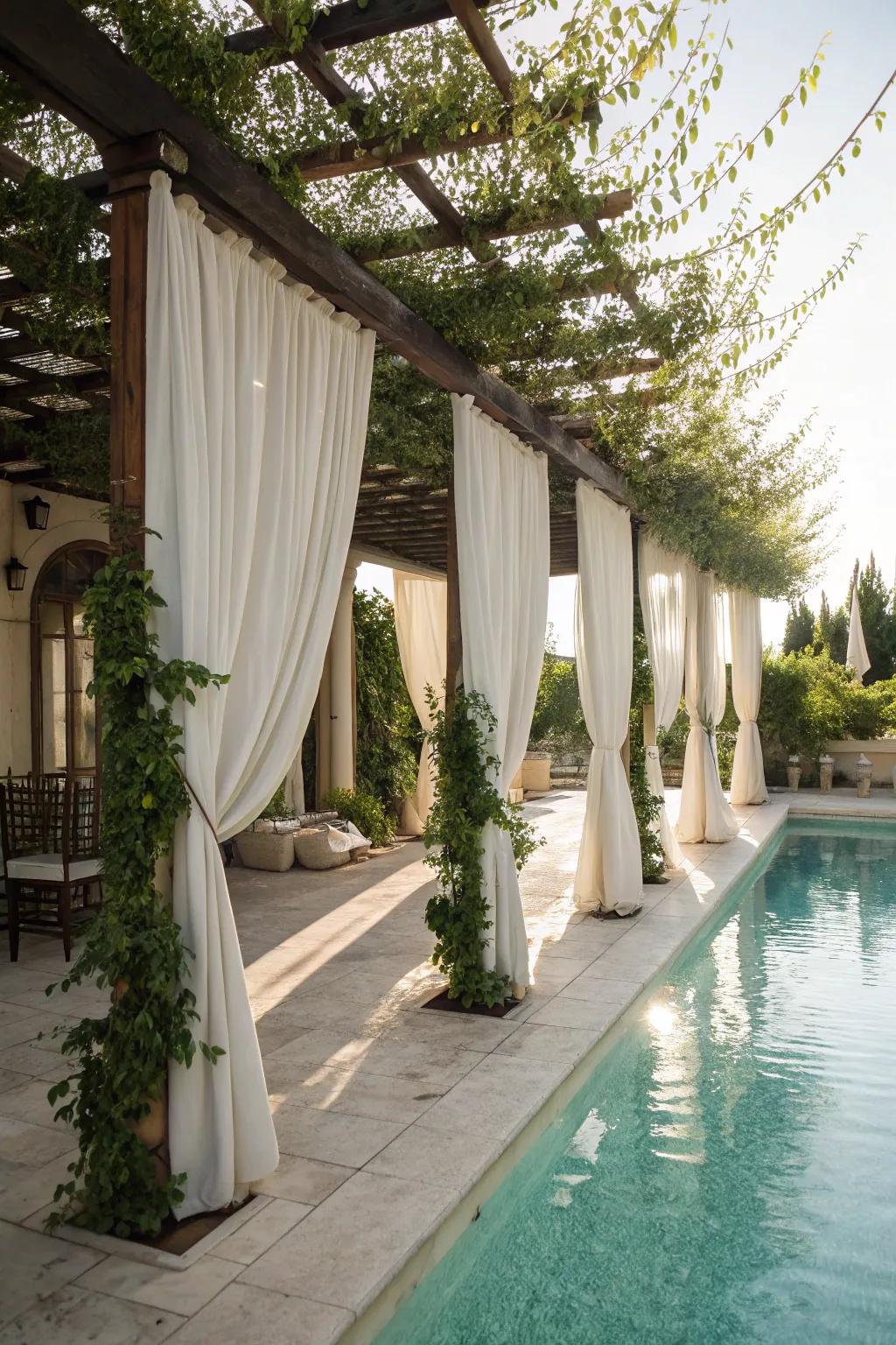 A pergola with drapes presents privacy and sophistication.