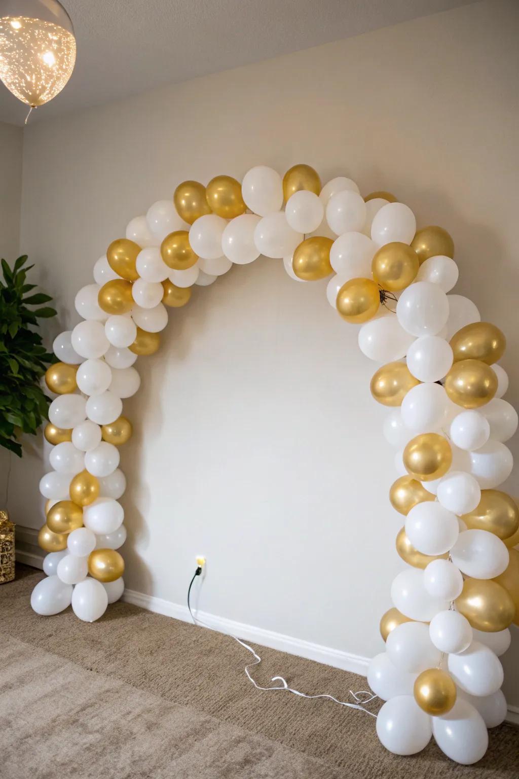 A chic minimalist balloon arch featuring a monochrome palette.