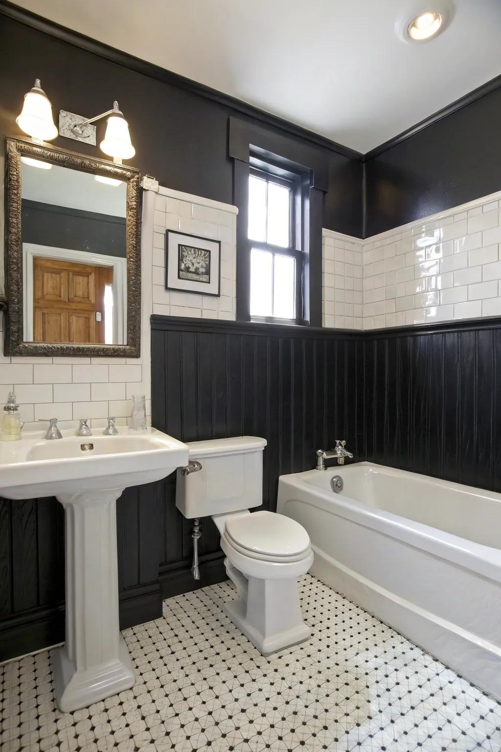 Elegant powder room showcasing dark wainscoting.