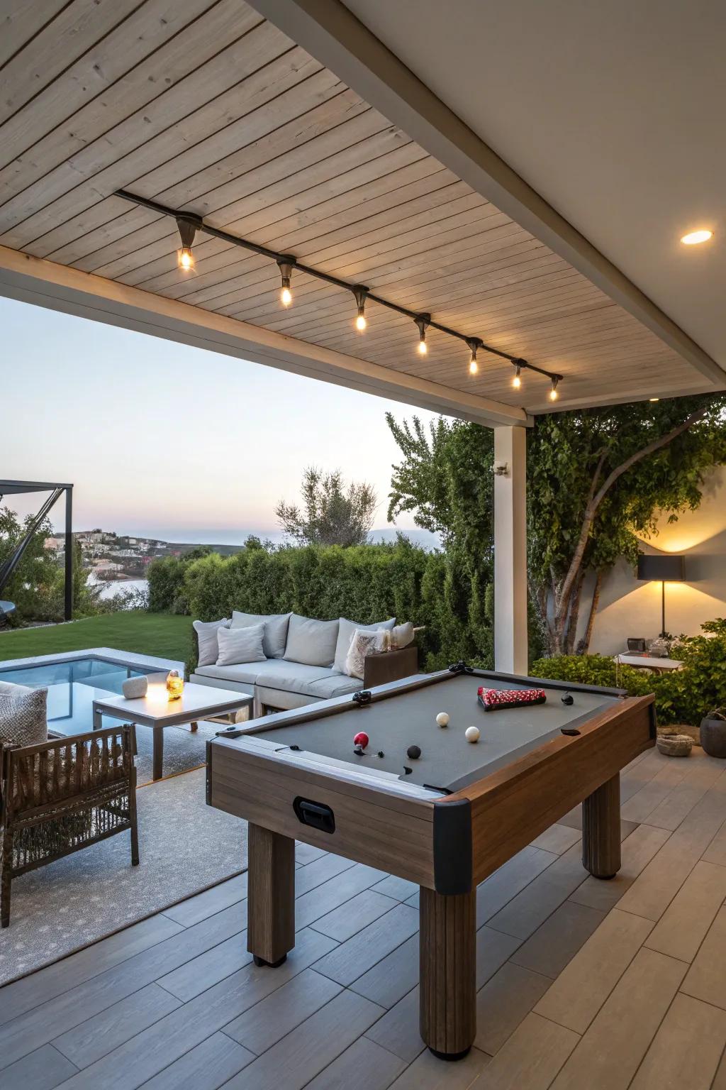 An adaptable outdoor zone with a pool table and relaxing lounge.