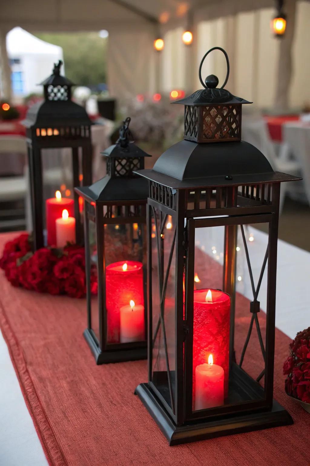 Dark lanterns accompanied by scarlet wax lights formulating a welcoming and snug centerpiece.