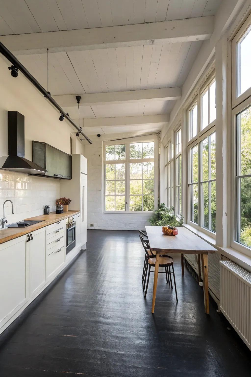 An open kitchen configuration where dark flooring assumes center stage.