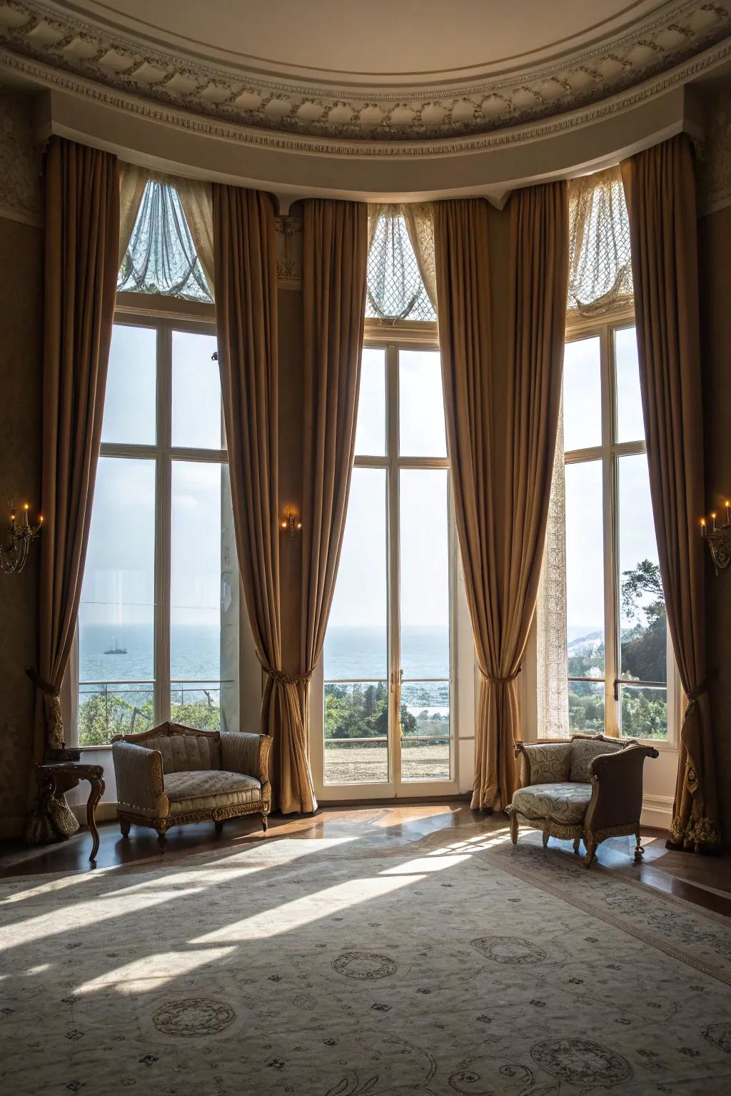 Floor-to-ceiling draperies add a layer of drama and sophistication.