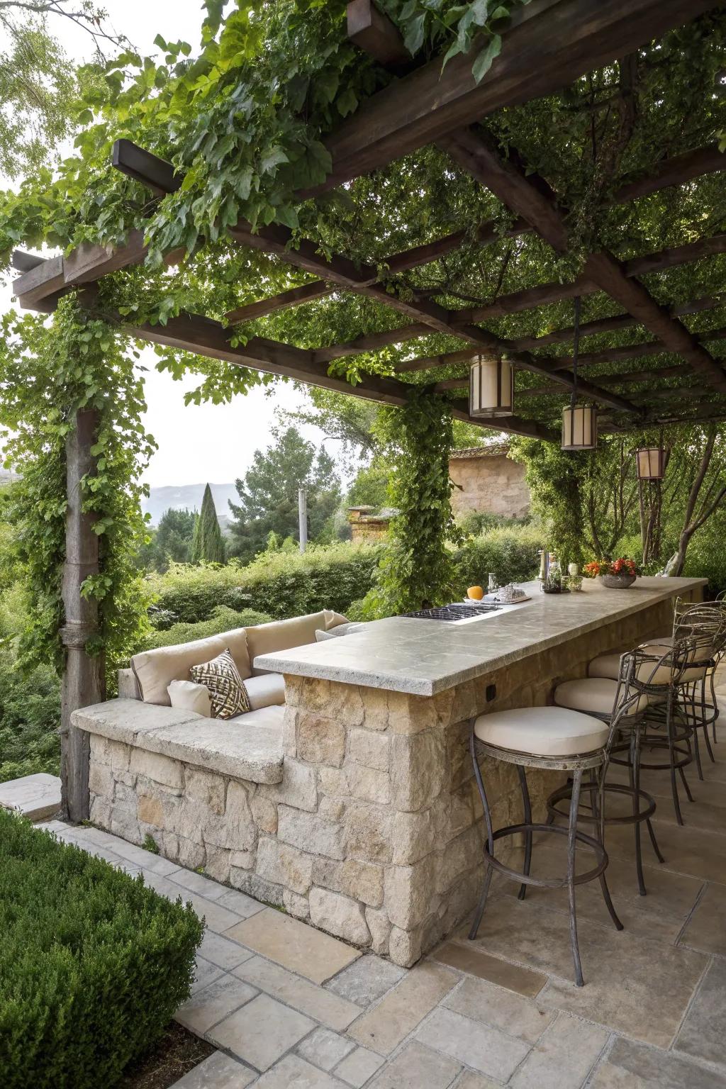 An attractive stone bar positioned under an exquisite pergola.