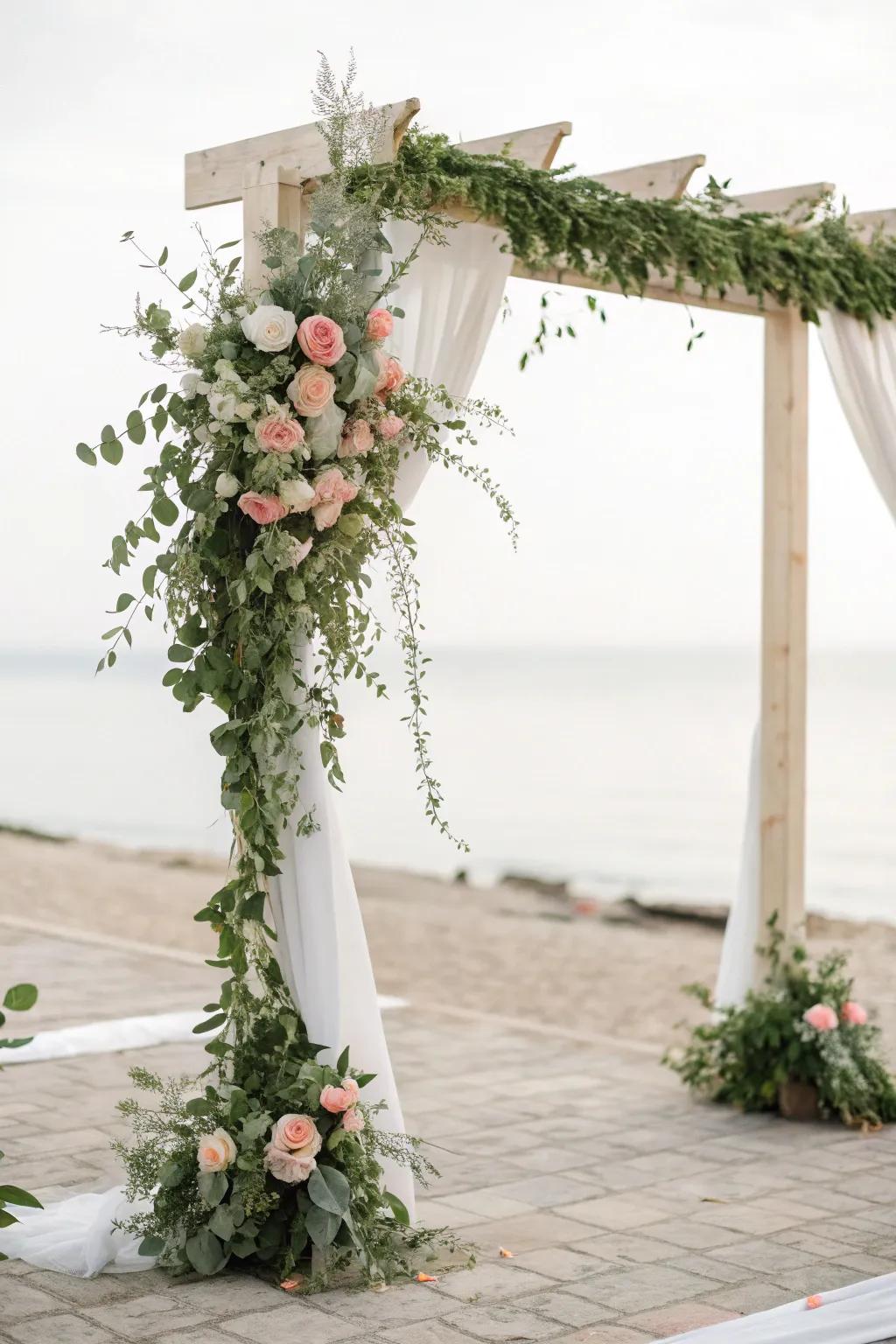 An uncomplicated arch featuring verdant elements and blossoms frames the ceremony beautifully.