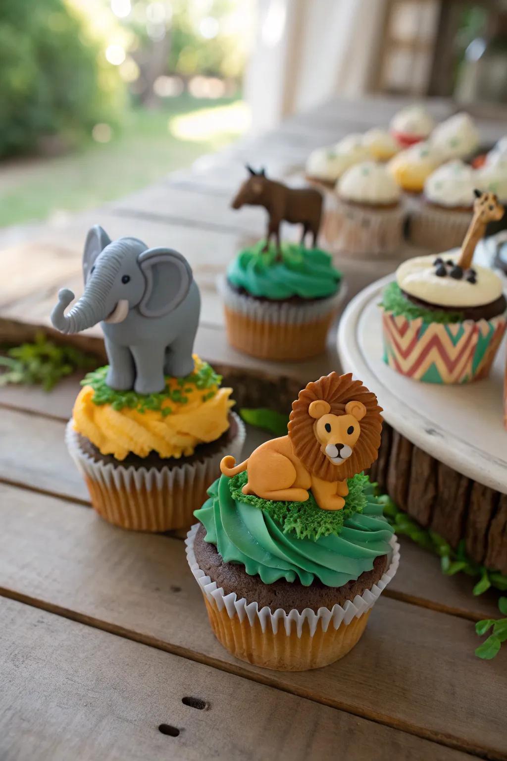 Safari animal-topped cupcakes present a playful escapade theme.