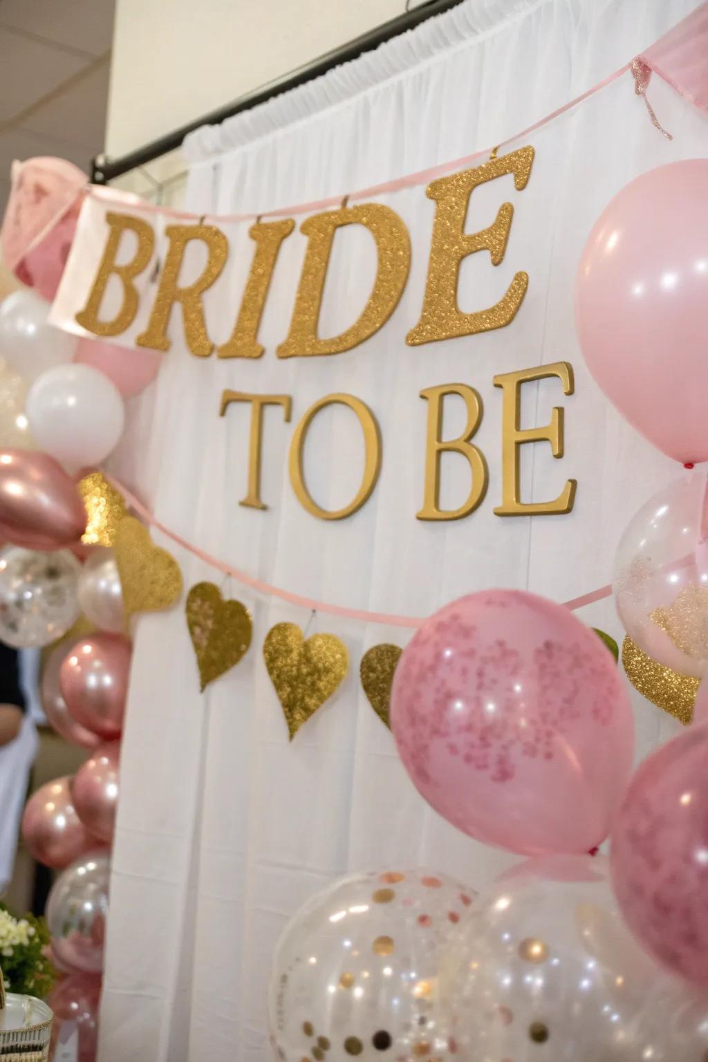 A catchy 'Bride to Be' banner in rose and gold.