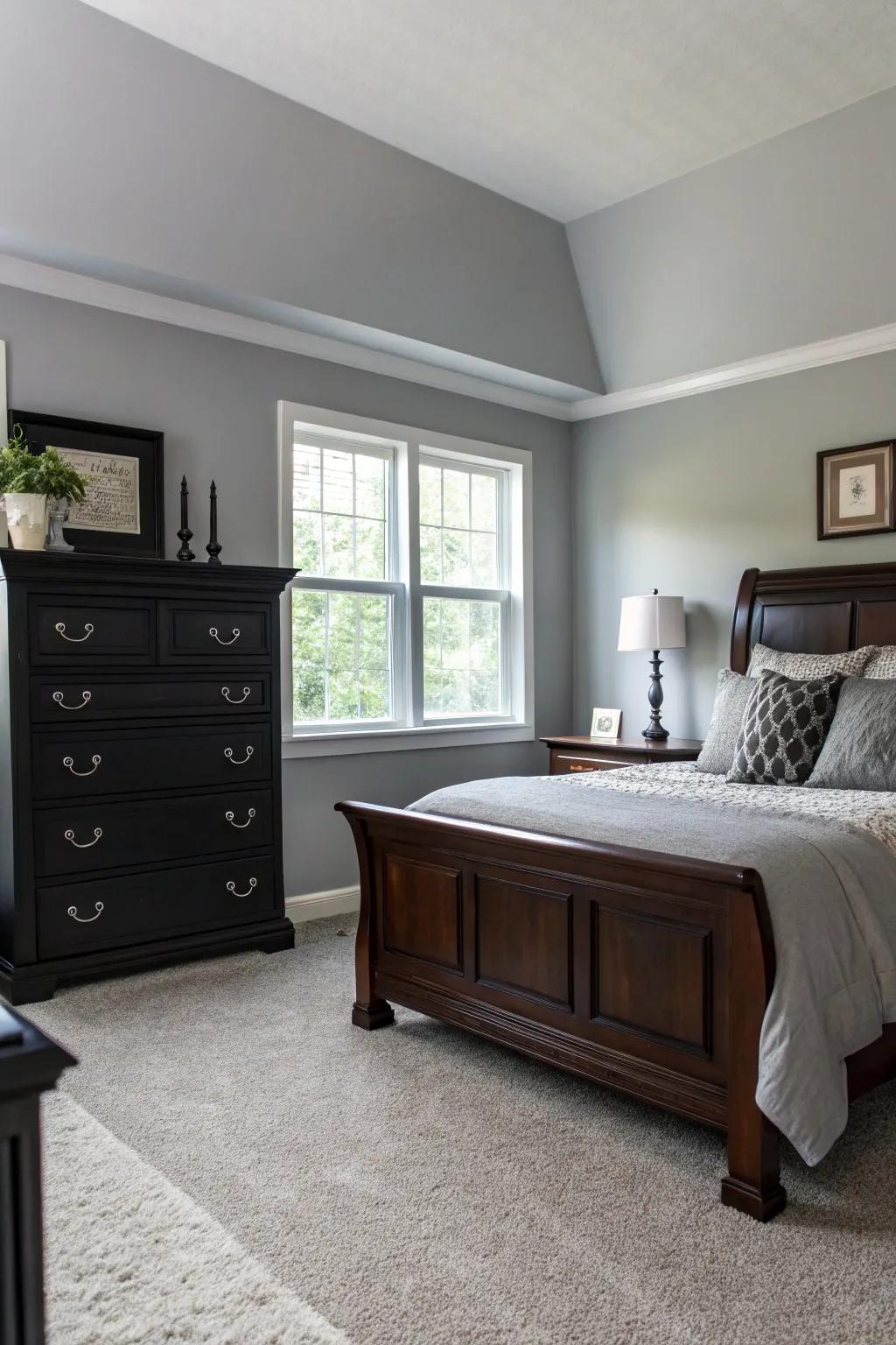 Dark furniture creates a striking contrast against Willow Gray walls.