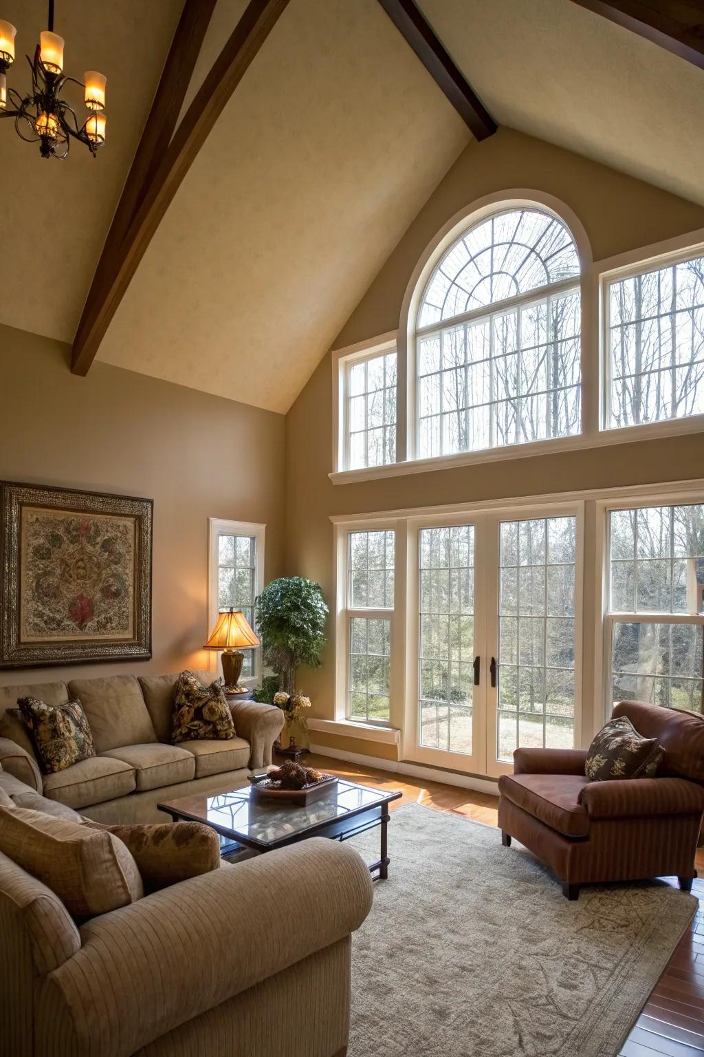 Living room featuring a vaulted ceiling and expansive glazing accentuating the wall