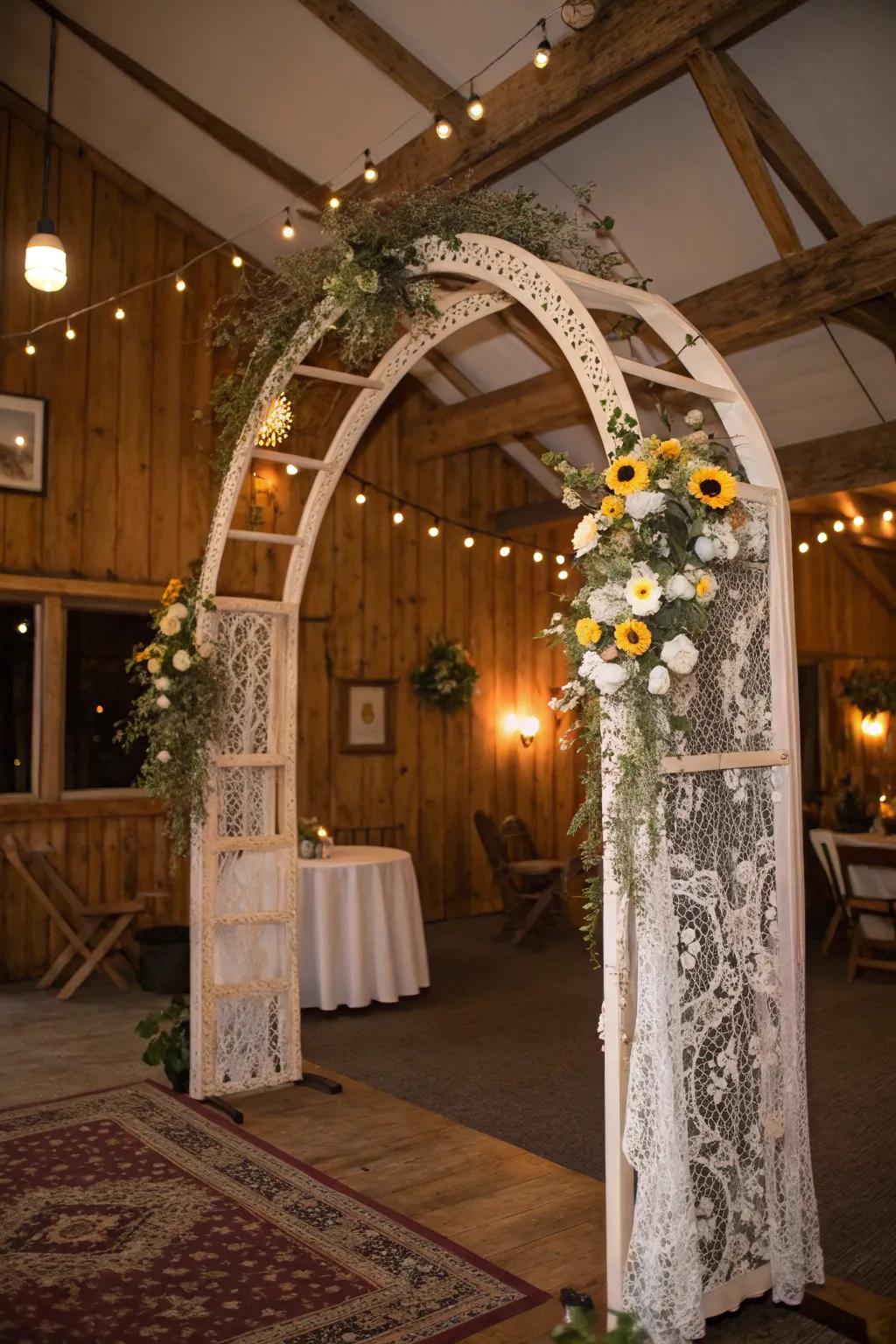A vintage-inspired arch featuring lace and wildflowers for a nostalgic touch.