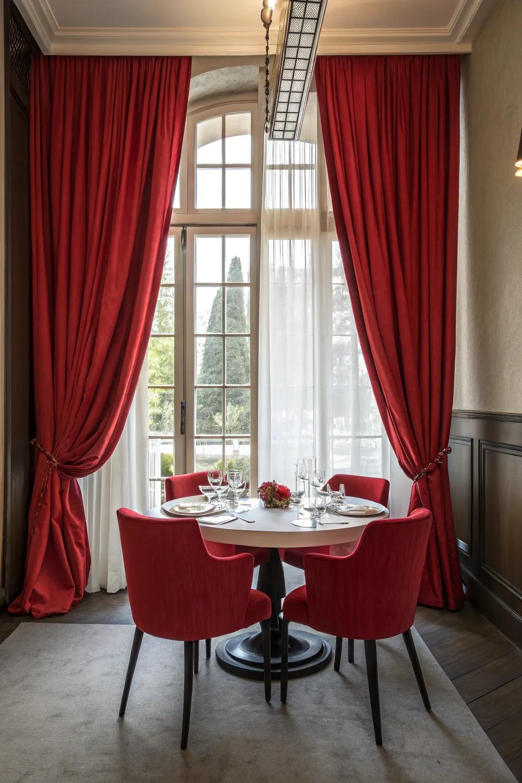 Strong red window coverings add drama and character to this dining area.