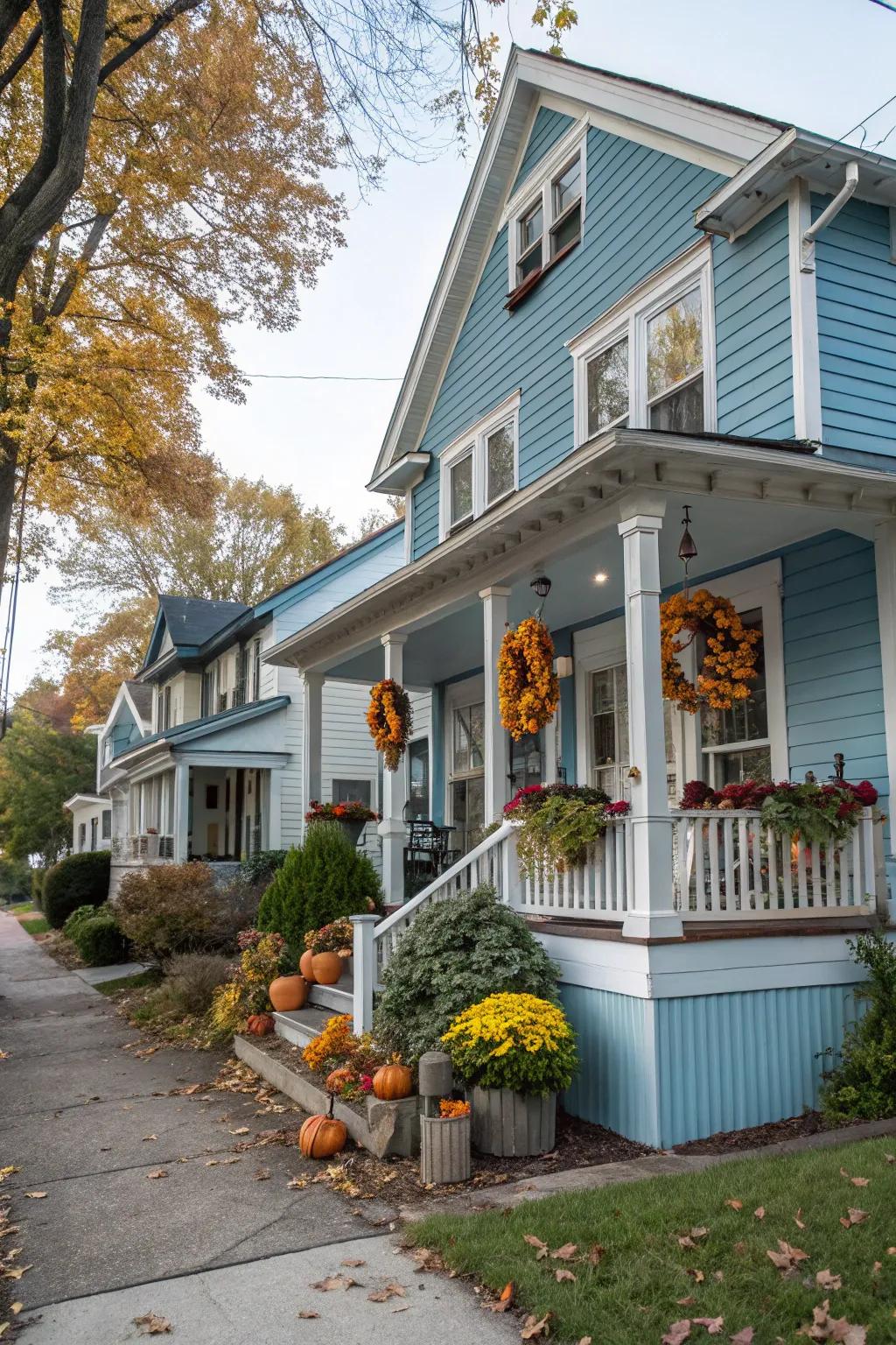 Seasonal decorations keep your blue house vibrant and inviting.