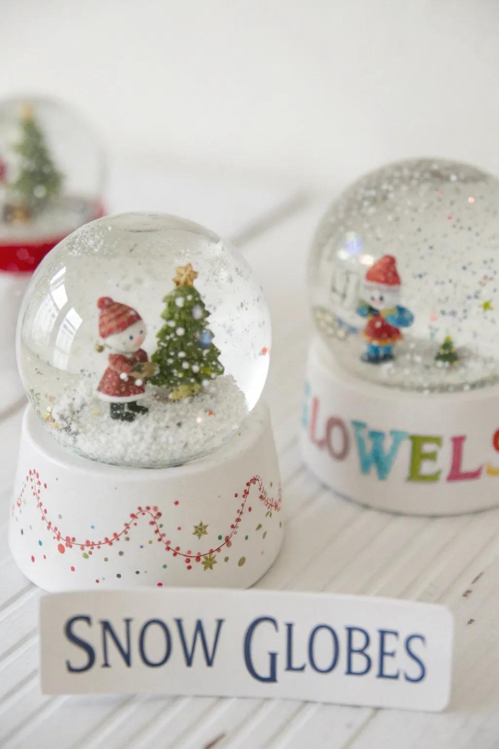 Custom snow globes add a magical touch to your table theme.