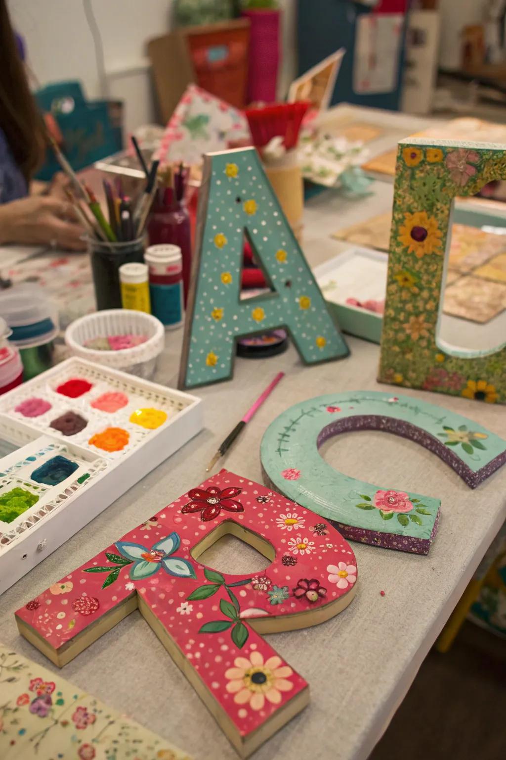 Mixed media letters with a variety of textures.