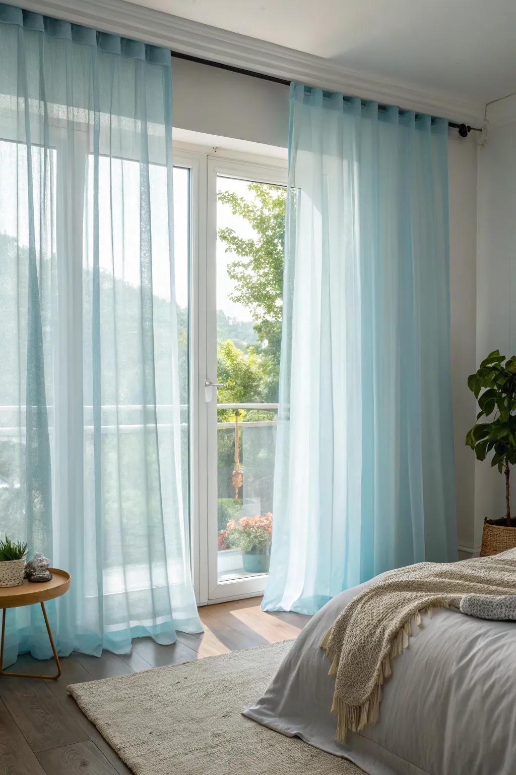 Light blue curtains enhance the airiness and brightness of this bedroom.