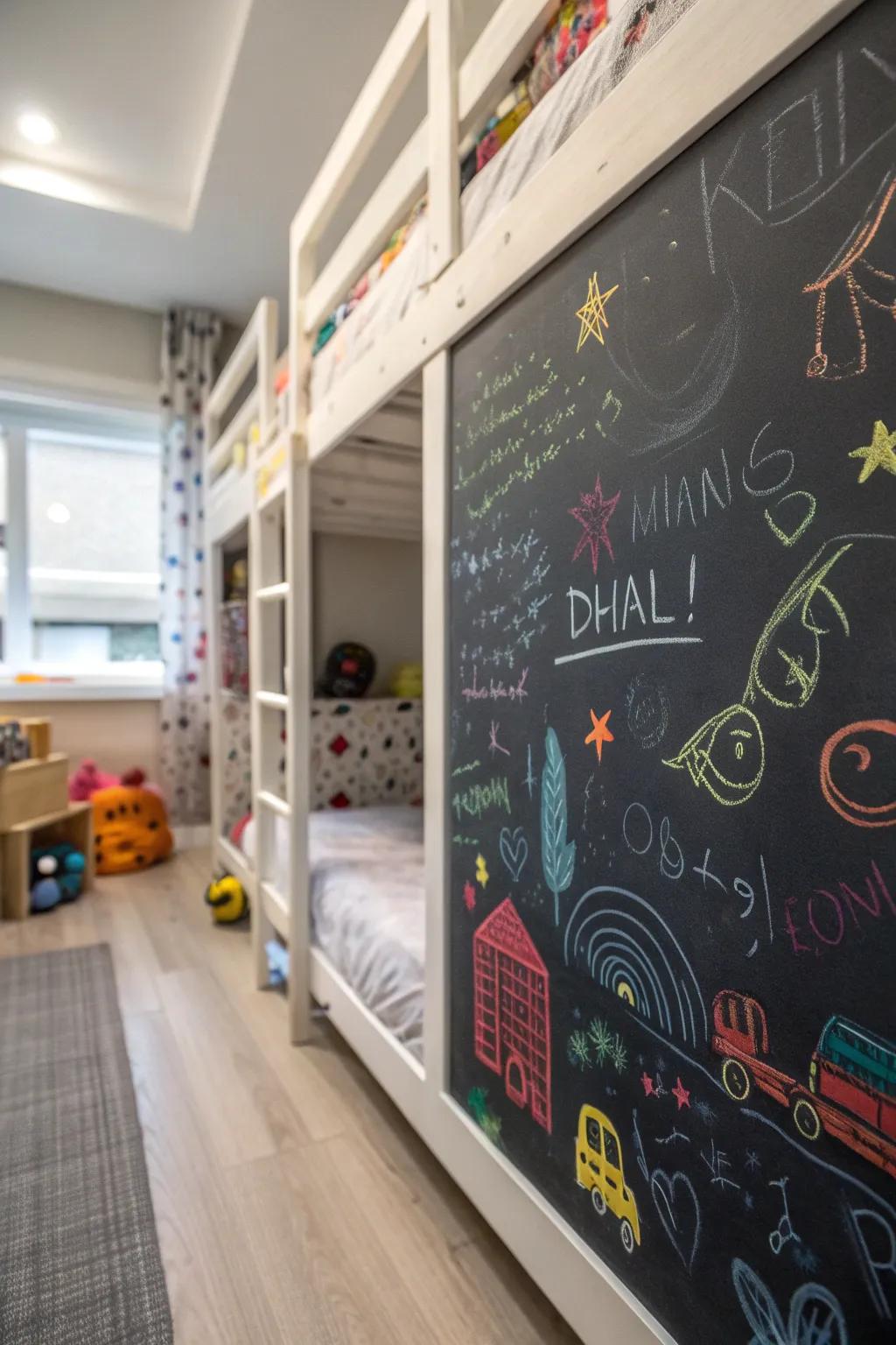 A creative chalkboard wall underneath the bunk bed.