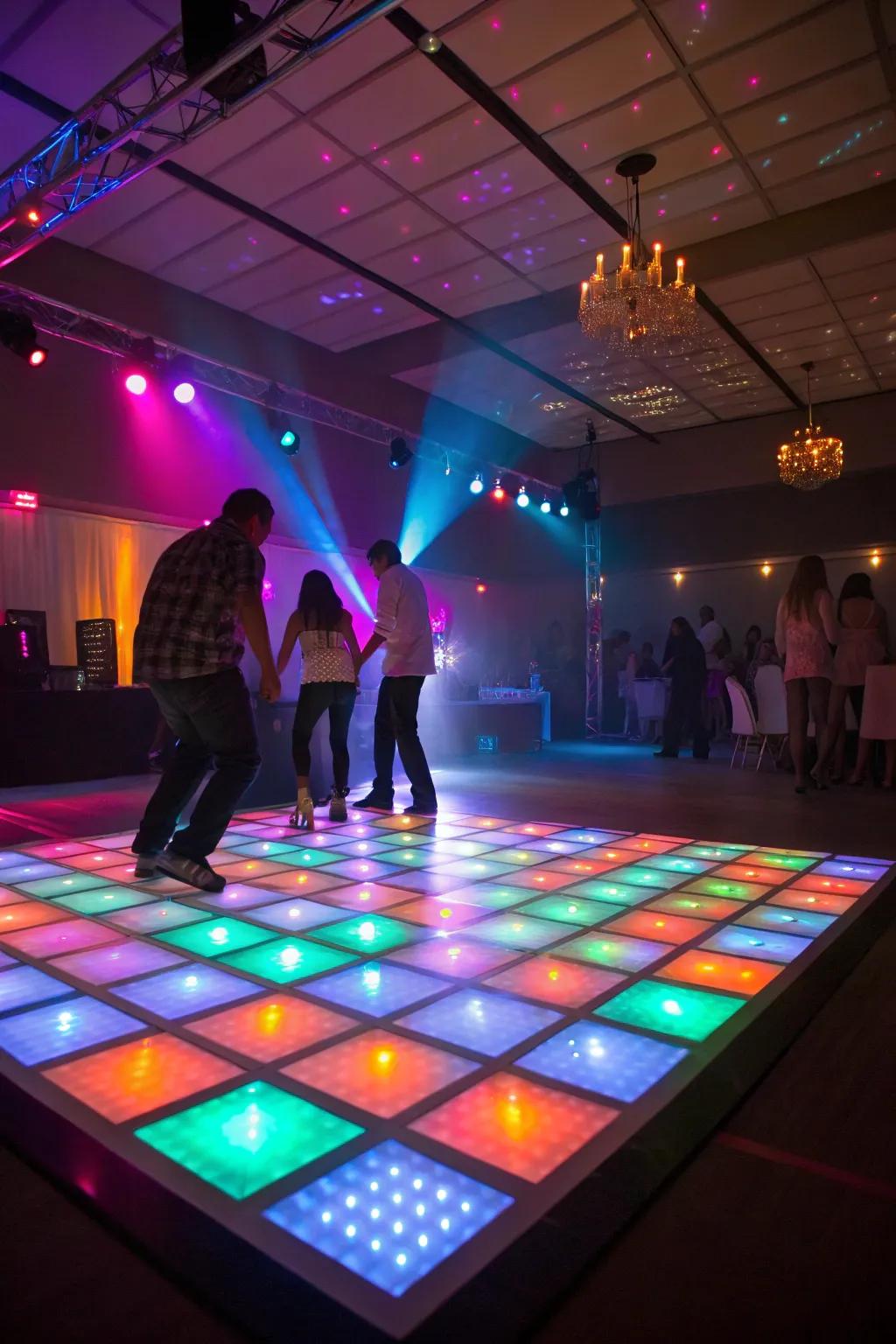 A radiant dance floor entices attendees to dance throughout the night.