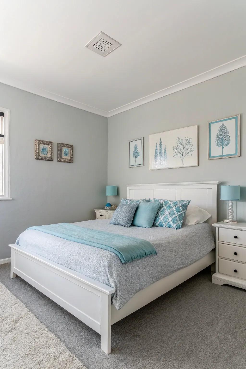 A minimalist style employing grey walls and azure features creates a tranquil bedroom.