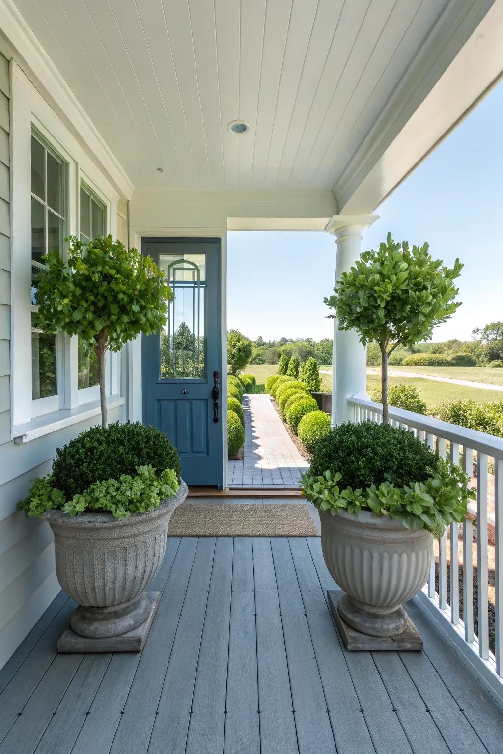 A side porch displaying symmetrical planters flanking a central entrance.